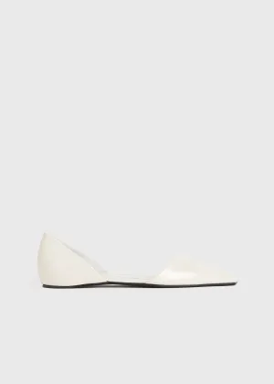 The Asymmetric D'Orsay Flat snow